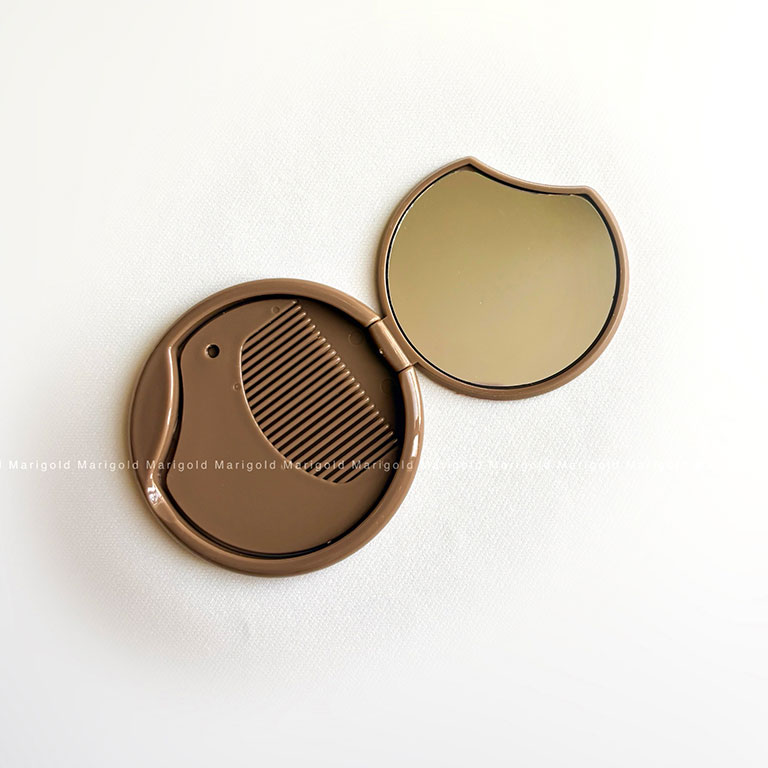 آینه جیبی شانه دار